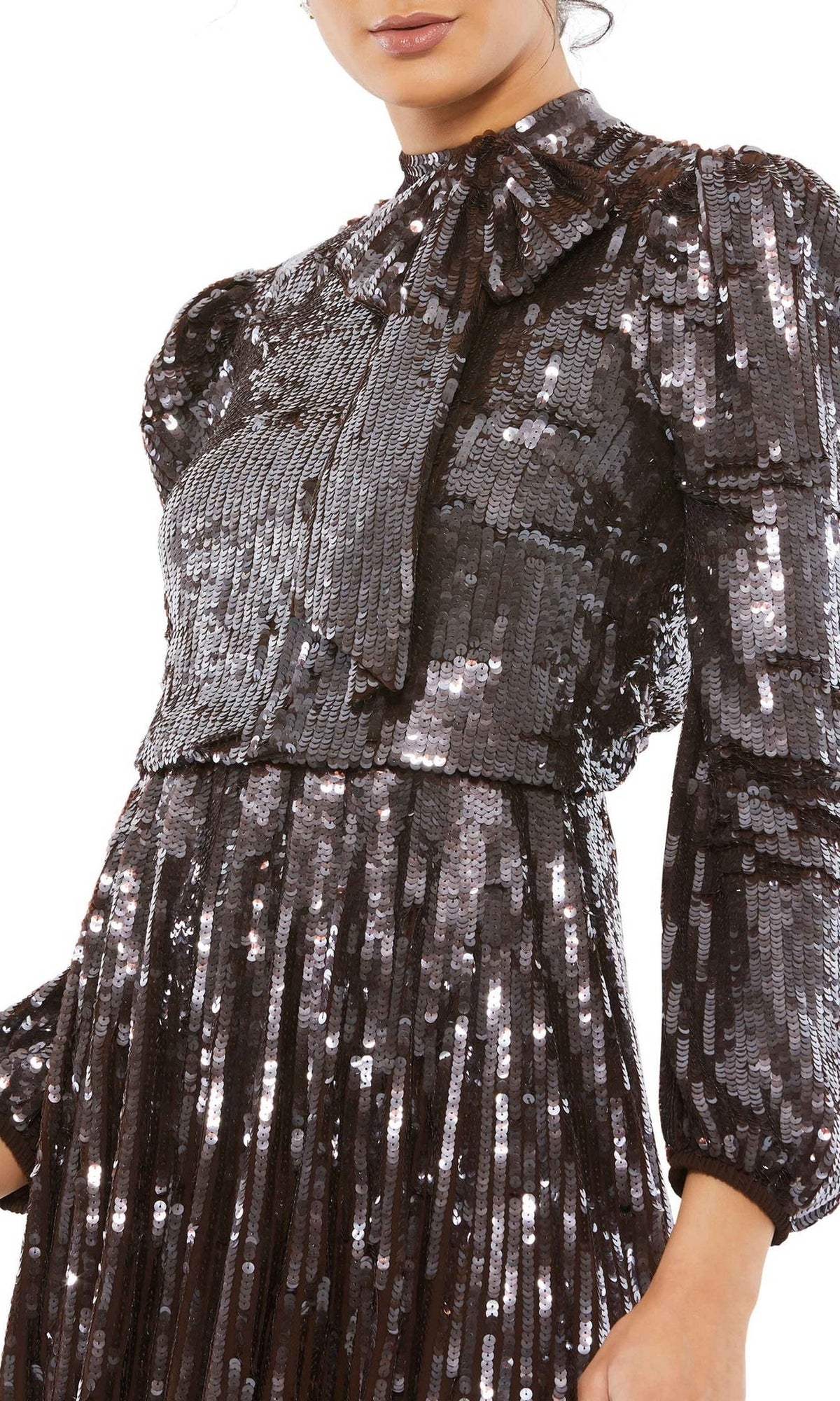 Woman wearing the Mac Duggal 93642 brown midi wedding guest dress—features long sleeves, shiny sequins, and a bow detail at the collar for an elegant occasion look.